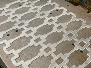 Water Jet cut aluminum sheet with intricate features